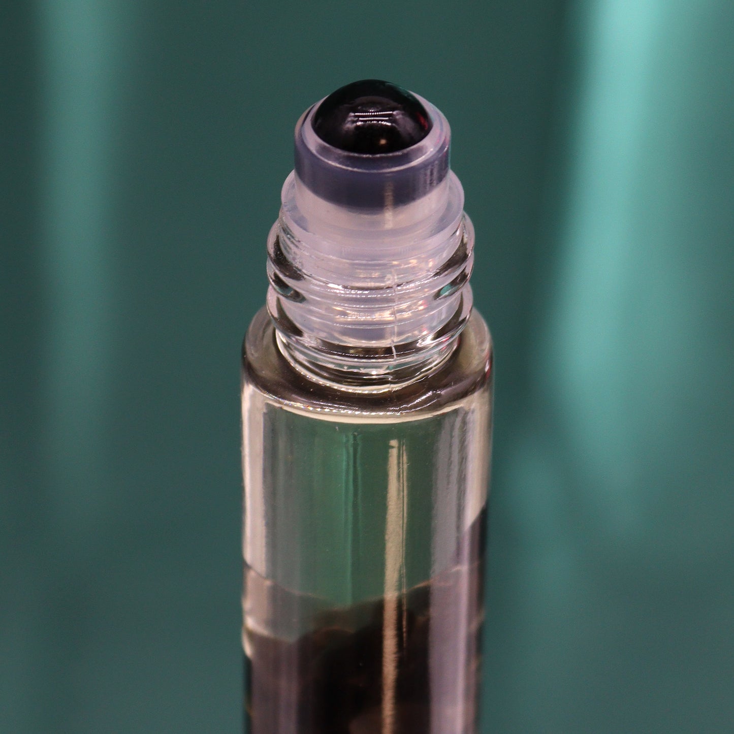 The Knight of Swords – Hope Hare Gemstone Essential Oil Roll On | Black Tourmaline with Cedarwood, Patchouli, Palmarosa, Vetiver & Neroli